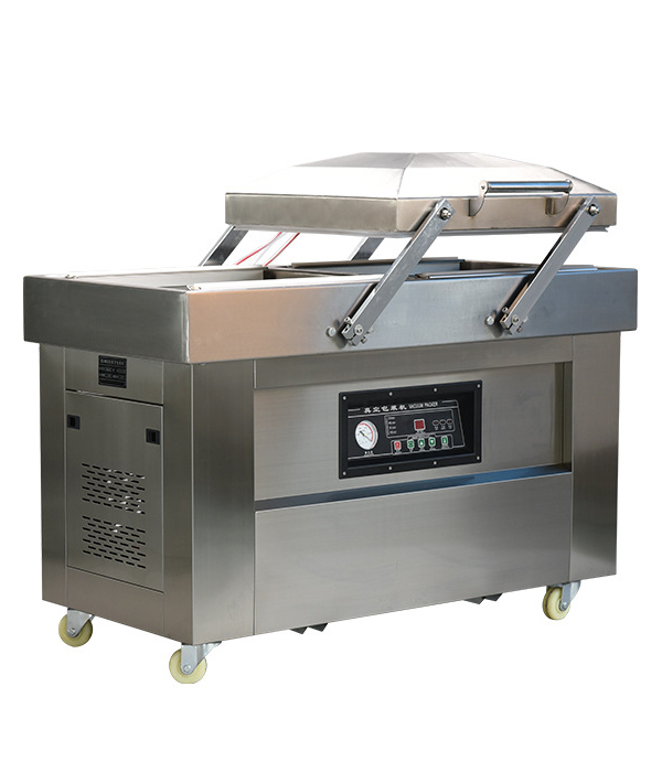 Double chamber vacuum packaging machine